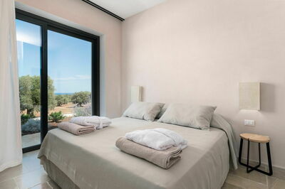 Een slaapkamer in Villa Orama Relais