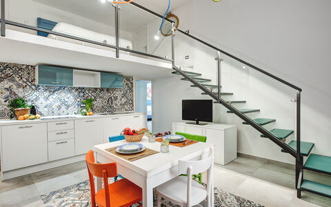 Loft In Sorrento: Meubilair, Cabinetry, Eigendom, Countertop, Tafel, Keuken, Oranje, Verlichting, Interieur Ontwerp, Stoel