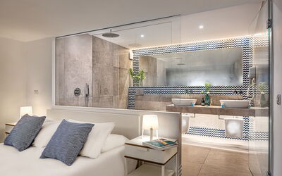 Monolocale Deluxe Wave: Eigendom, Meubilair, Gebouw, Comfort, Lamp, Interieur Ontwerp, Woonkamer, Architectuur, Flooring, Verdieping