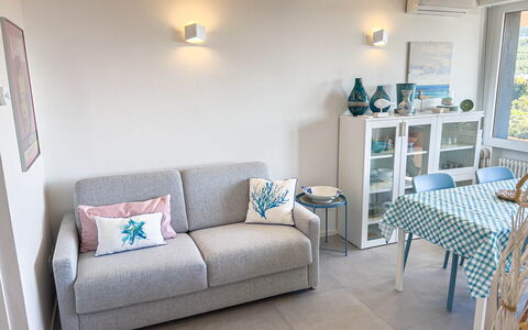 Appartamento La Castellana: Meubilair, Eigendom, Bankstel, Blauw, Azure, Interieur Ontwerp, Verdieping, Flooring, Woonkamer