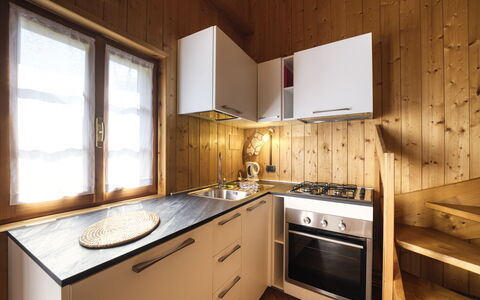 Incanto Walser Apartments Testa: Countertop, Cabinetry, Eigendom, Gebouw, Meubilair, Venster, Wastafel, Keuken, Lade, Hout