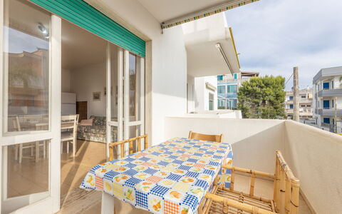 Apartment Living In Baia Verde - Gallipoli: Eigendom, Tafel, Gebouw, Azure, Hout, Interieur Ontwerp, Verlichting, Architectuur, Stoel, Flooring