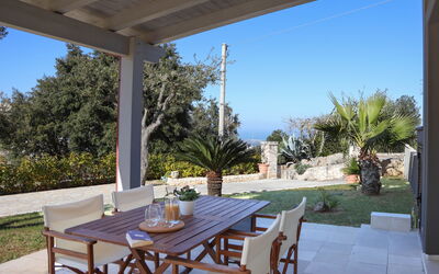 Villa Don Sante In Locorotondo Puglia: Fabriek, Tafel, Meubilair, Eigendom, Lucht, Stoel, Azure, Schaduw, Verlichting, Boom