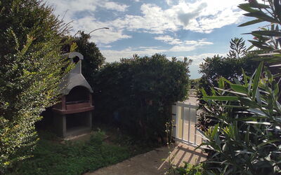 Casa Gavina With Garden Alghero: Lucht, Struik, Tuin, Ochtend, Zonlicht, Landscaping, Werf, Backyard, Avond