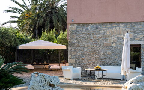 Villa dello Zingaro: Meubilair, Schaduw, Buitenmeubels, Stoel, Bloempot, Toevlucht, Eco Hotel, Tuin, Flagstone, Landscaping