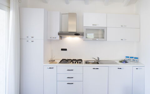 Villa Leccio 2: Keuken, Major Appliance, Toestel Van De Keuken, Countertop, Cabinetry, Interieur Ontwerp, Fornuis, Huishoudapparatuur, Gootsteen, Flooring