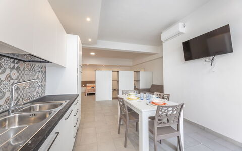 Appartamento Monomare, Gallipoli: Flooring, Verdieping, Interieur Ontwerp, Plafond, Countertop, Keuken, Kamer, Appartement, Major Appliance, Houten Vloer