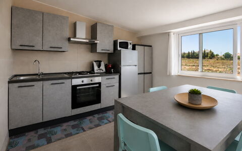 Villa Giugiola: Meubilair, Keuken, Countertop, Flooring, Interieur Ontwerp, Verdieping, Major Appliance, Cabinetry, Huis, Toestel Van De Keuken