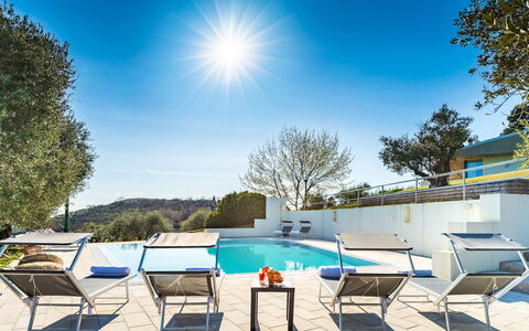 Villa degli Ulivi 8: Blauw, Zwembad, Buitenmeubels, Toevlucht, Stoel, Schaduw, Ligstoel, Landscaping, Eco Hotel, Hotel