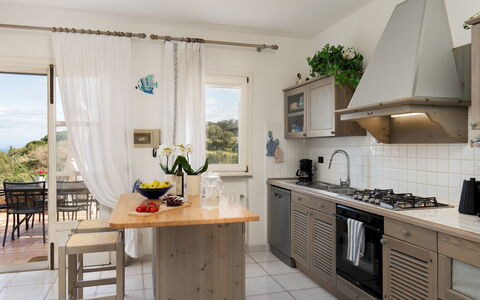 Villa Perelle 8: Meubilair, Keuken, Toestel Van De Keuken, Interieur Ontwerp, Countertop, Flooring, Hout, Major Appliance, Cabinetry, Verdieping
